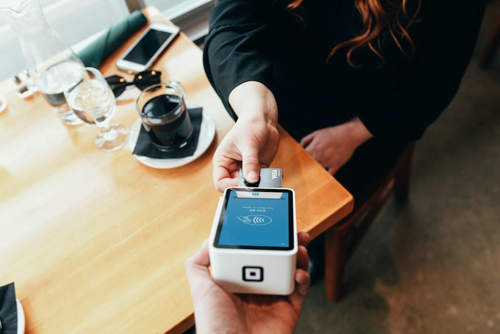 Restaurant payment being processed on a card terminal